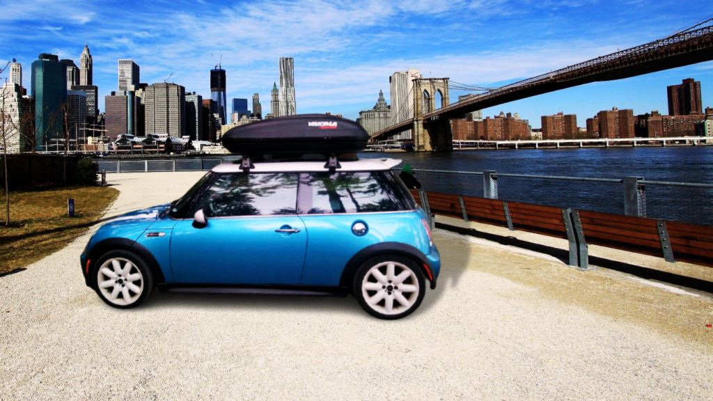 I park my blue mini cooper in the part with Yakima black cargo box on top