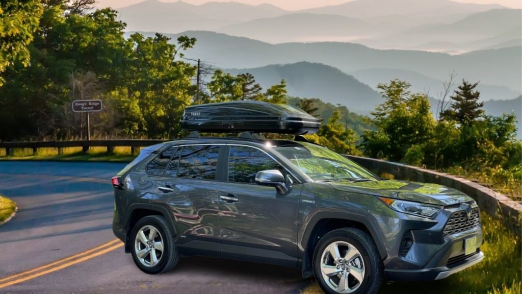thule pulse cargo box on Toyota Rav4 on the side of the country roads