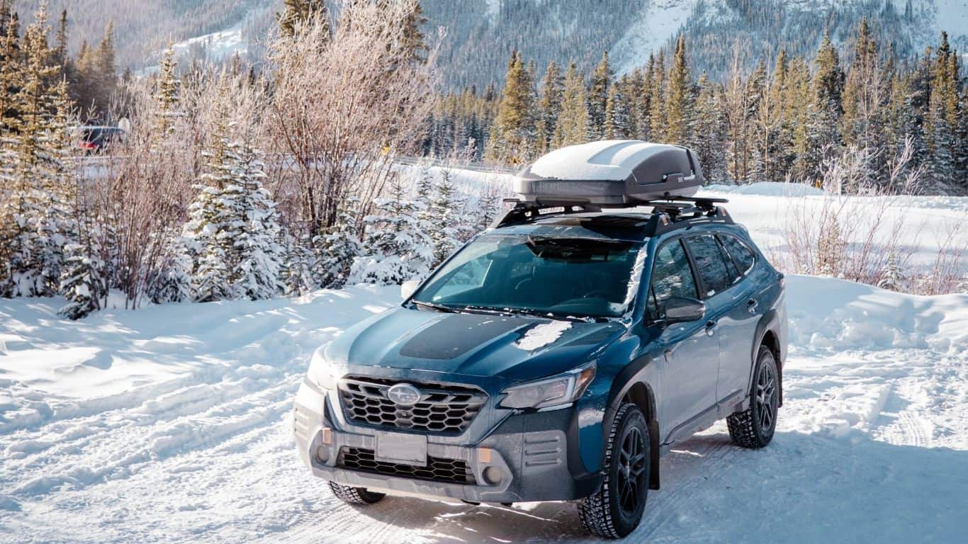 drive my Subaru Outback to the mountain zone in winter with Thule Motion XT on top for loading my camping luggage and skiing gear