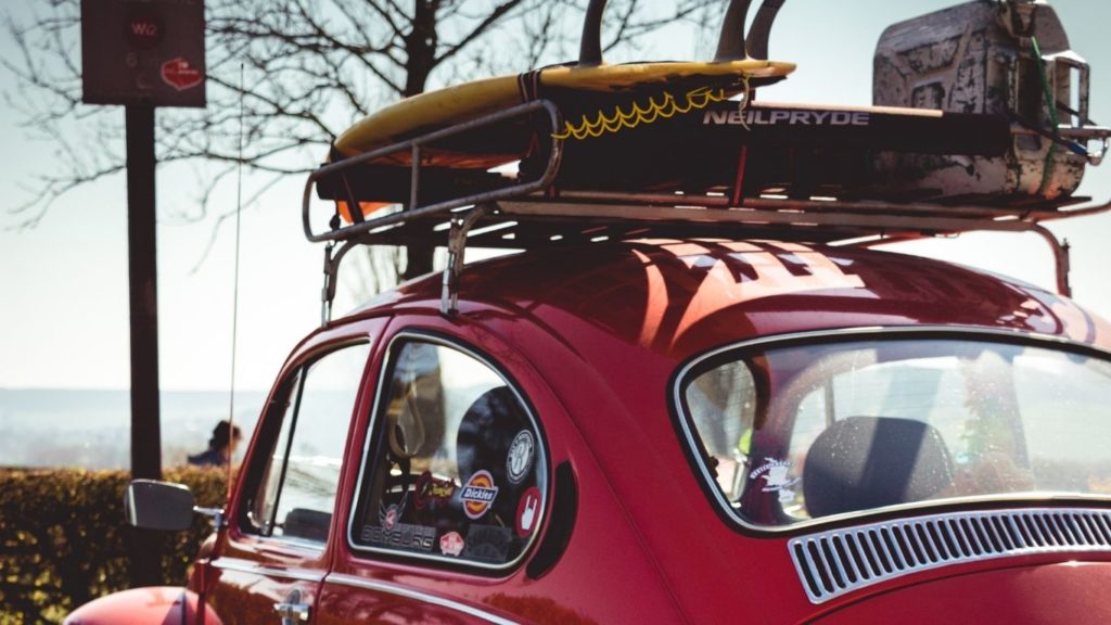 cargo basket has a canoe and a gasoline bucket on top of it