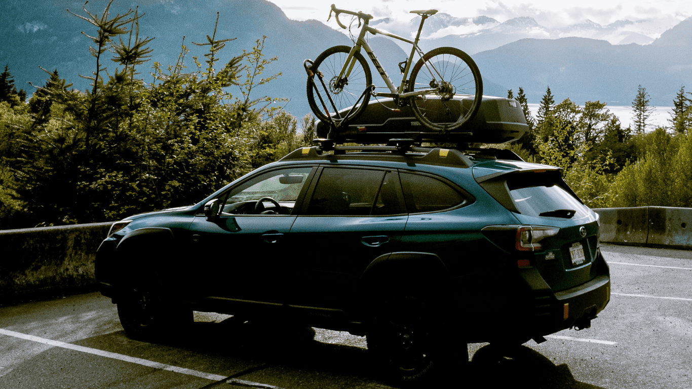 rooftop bike rack and Force XT roof box on Subaru Outback