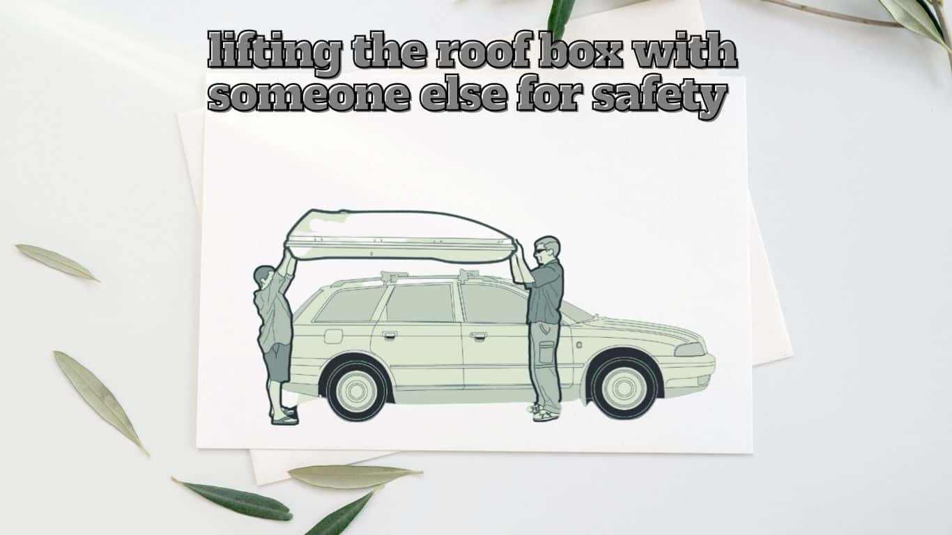 lifting the roof cargo box with someone else for easy installation and accuracy.
