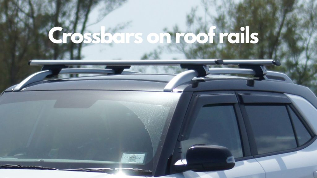 lock crossbars on roof rails
