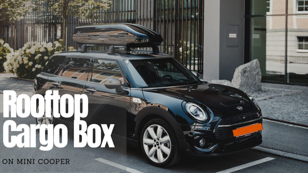 Mini Cooper with rooftop cargo box
