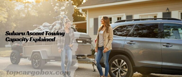 A driver pointing to the yellow payload capacity sticker inside the Ascent’s door jamb, emphasizing its importance.