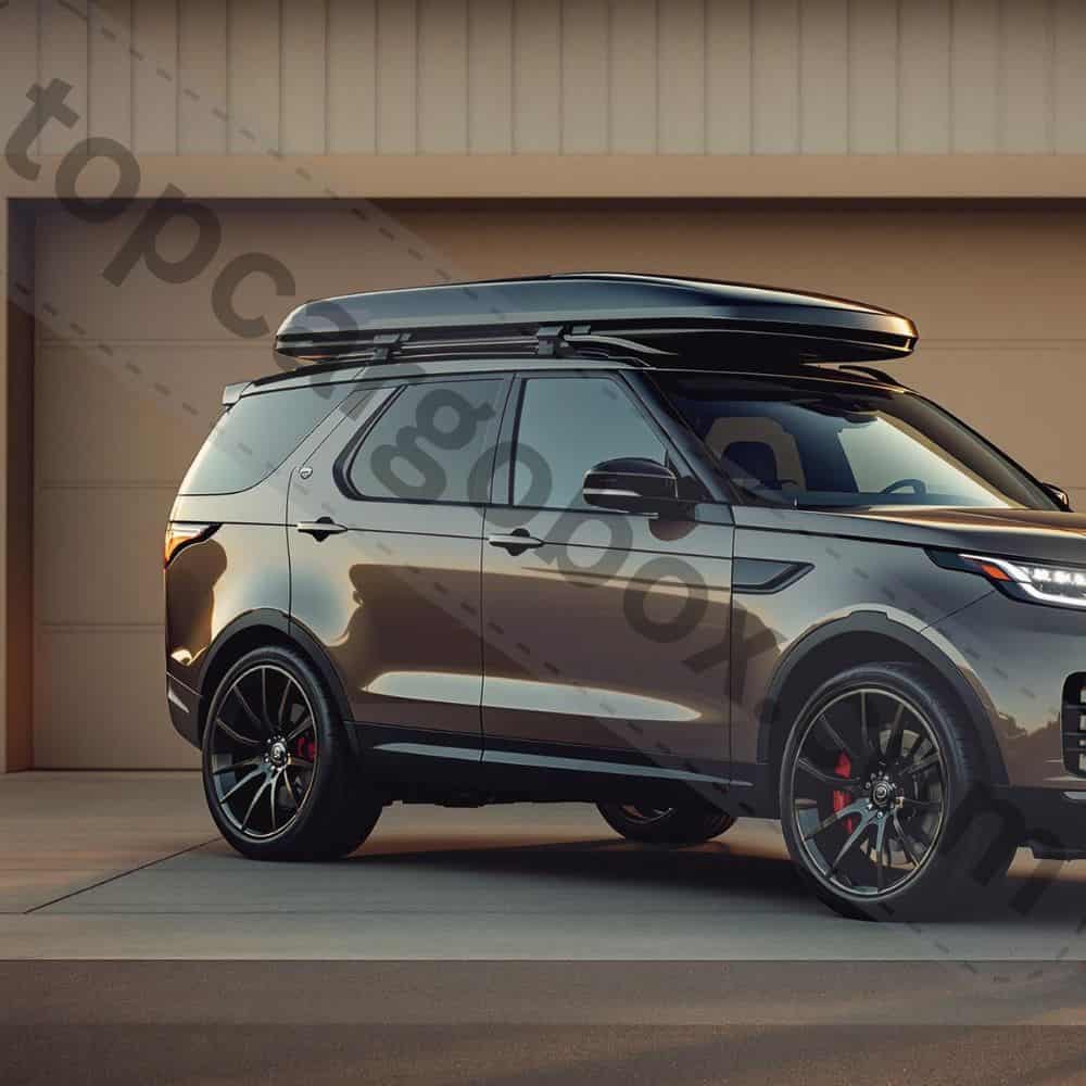 A step stool and moving blankets protect the car’s roof as the Motion 3 box is tilted into position during solo installation.