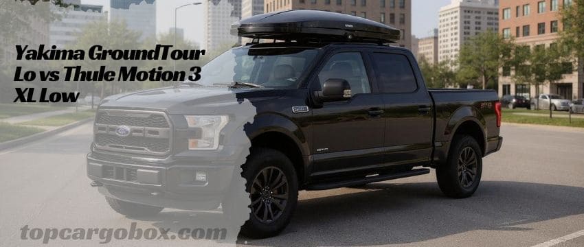 "A sleek black Yakima GrandTour Lo roof box mounted on a silver SUV, showcasing its low-profile design that adds only 10 inches of height."