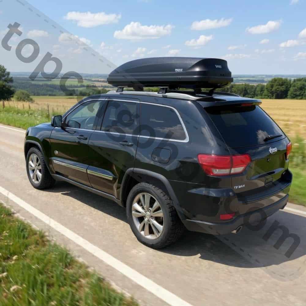 Hands pulling the Thule SecureLock cord to engage the locking mechanism, ensuring the lid is fully sealed before inserting the Comfort Key for final security.
