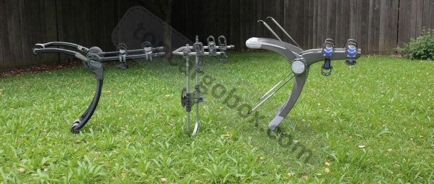 The rack folded flat for compact storage, leaning against a garage wall when not in use.
