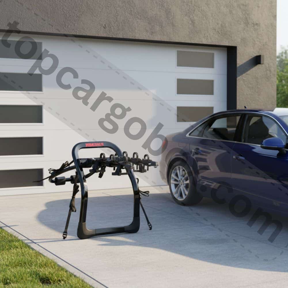 A close-up shot shows the rack's padded feet gently resting against the Audi's paint, highlighting the protective features that prevent scratches.